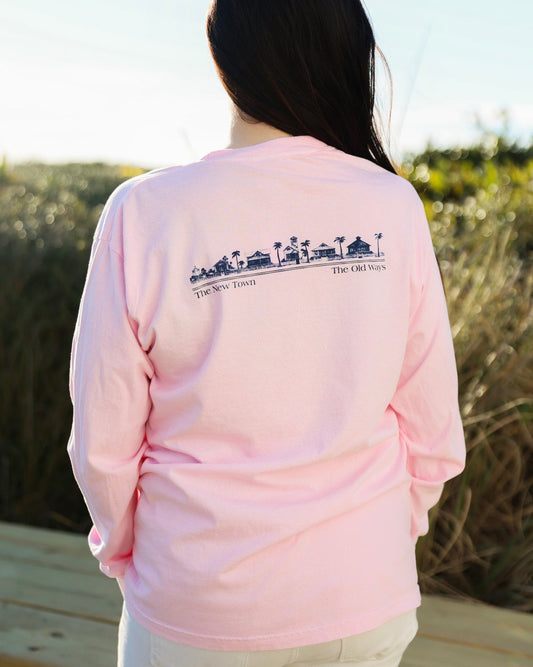 Blossom pink Long sleeve Unisex Seaside Tee back showing SEASIDE townscape new town old ways in navy