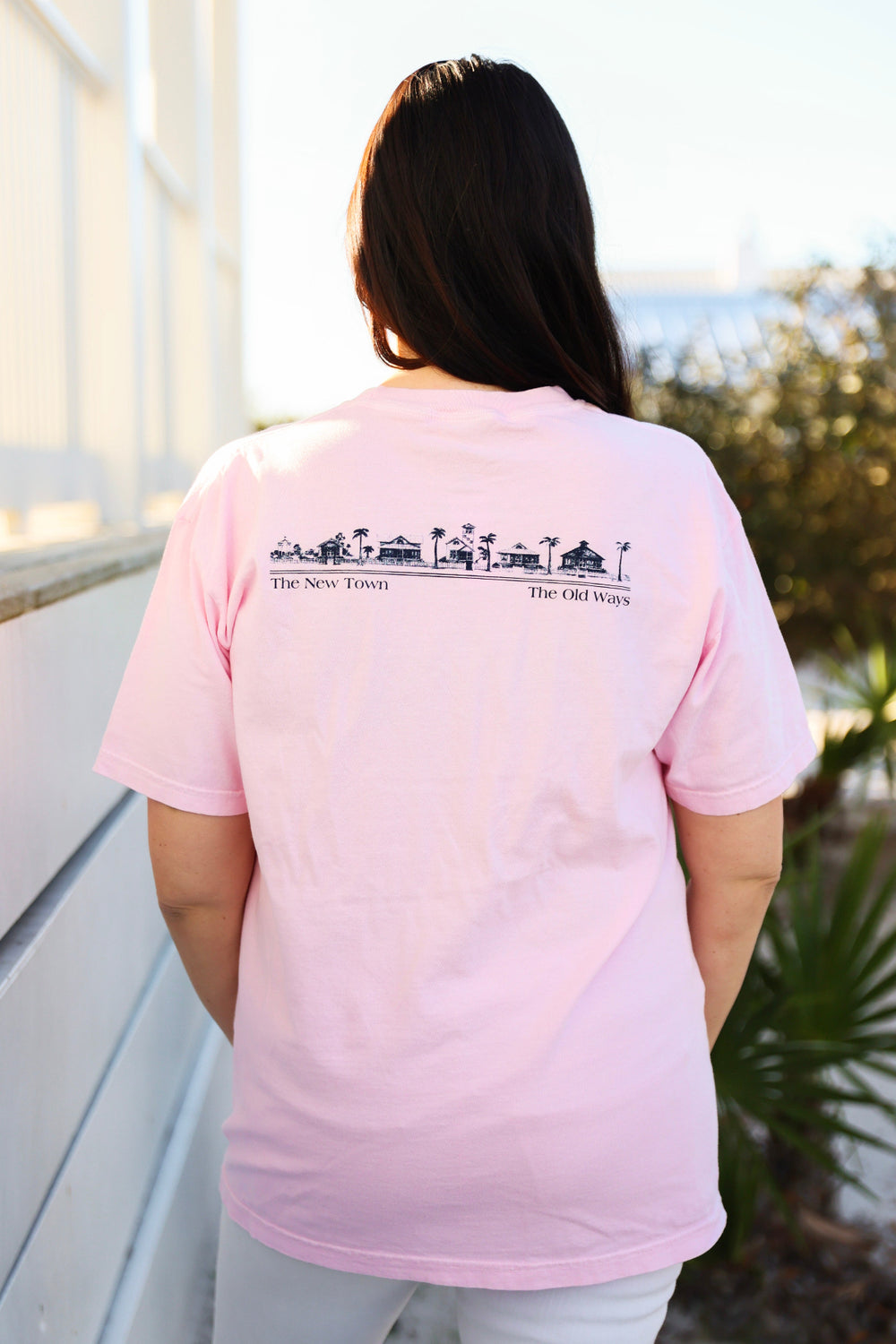 Blossom pink Short sleeve Unisex Seaside Tee back showing Seaside Townscape in navy new town old ways