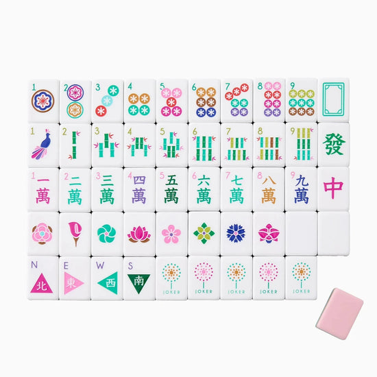 Set of colorful Mahjong tiles with various symbols on a white background