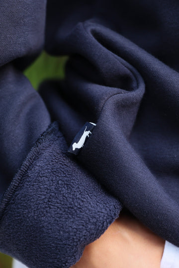 Navy Chenille Seaside Sweatshirt showcasing bud the dachshund 