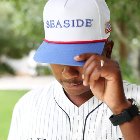 White Seaside Post Office snapback hat front with embroidered SEASIDE lettering