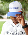 White Seaside Post Office snapback hat front with embroidered SEASIDE lettering