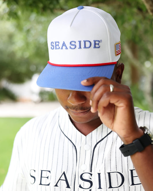 White Seaside Post Office snapback hat front with embroidered SEASIDE lettering