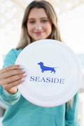 White Seaside Frisbee with Bud the Dachshund