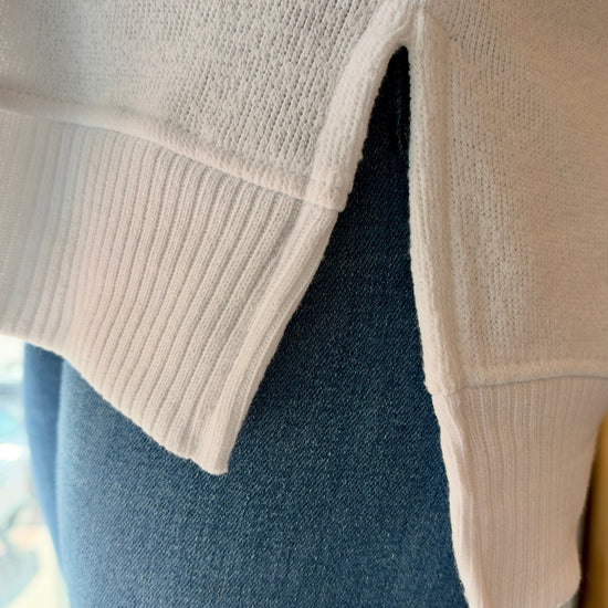 Side Slit Detail on the White Sunset Pullover