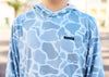 Blue patterned hoodie with a seaside logo on a blurred background