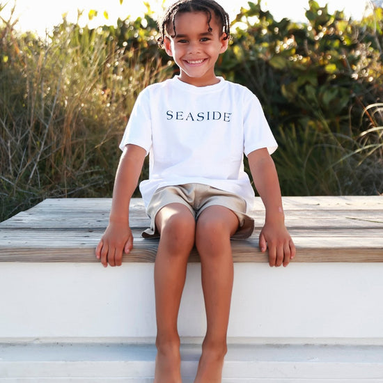 Youth Unisex White SEASIDE® Tee with Navy Lettering