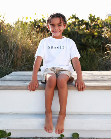 Youth Unisex White SEASIDE® Tee with Navy Lettering