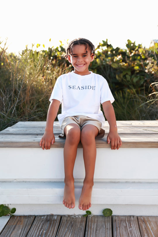 Youth Unisex White SEASIDE® Tee with Navy Lettering