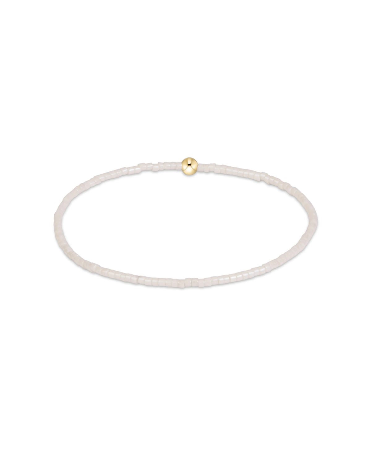 A delicate beaded bracelet in a translucent white or milky white material, featuring a single small gold bead accent at the top, shown on a plain white background.